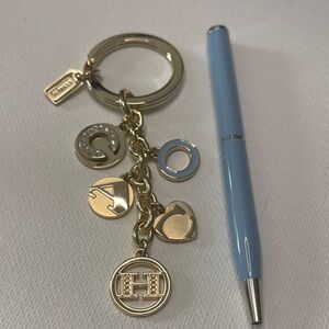 Coach Gold Keychain with Charms and Blue Coach Pen